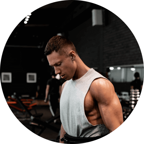 muscular men working out in gym